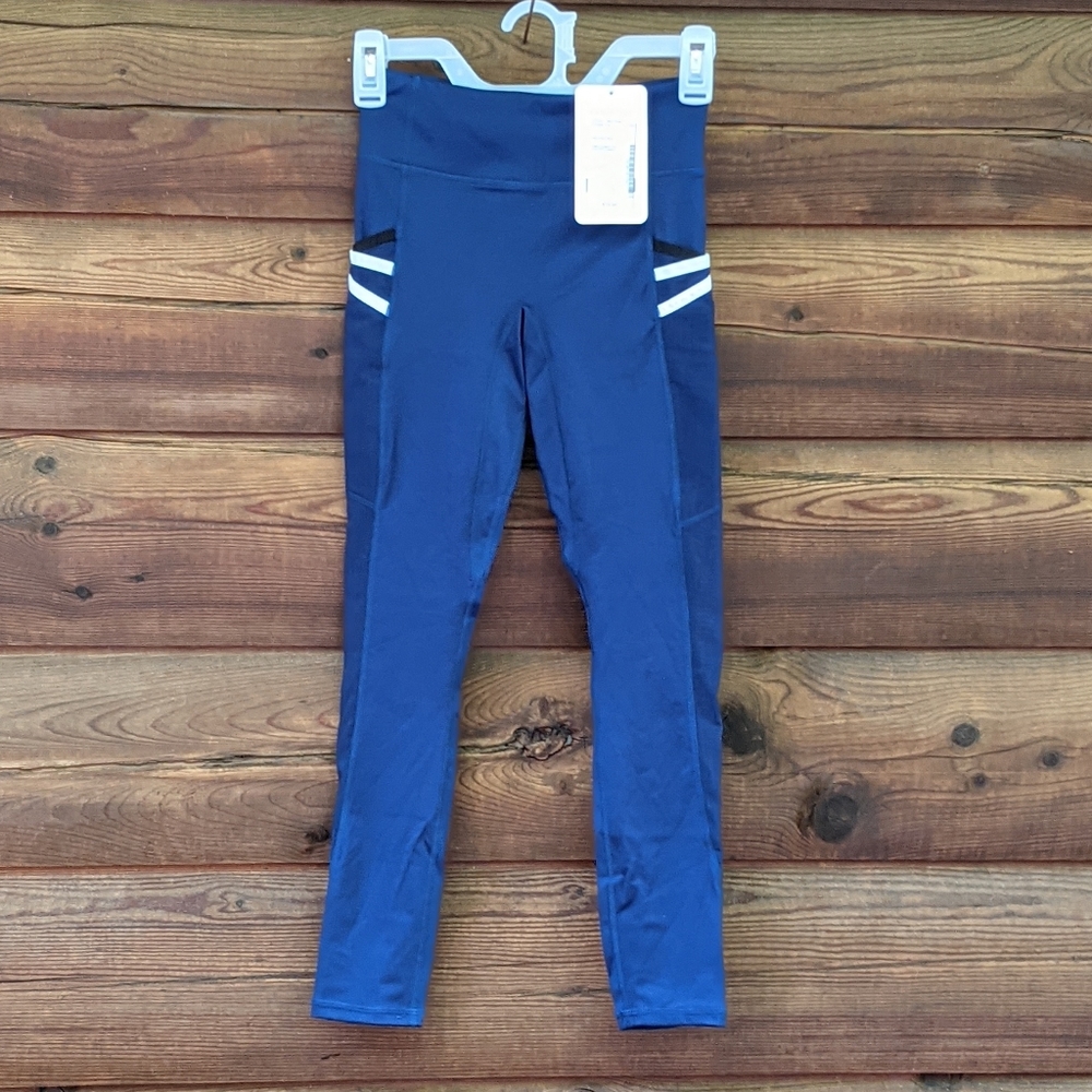 NWT Fabletics woman's leggings, netted sides